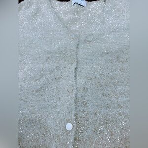 Sparkling off white color cardigan with silver & gold sparkling strands